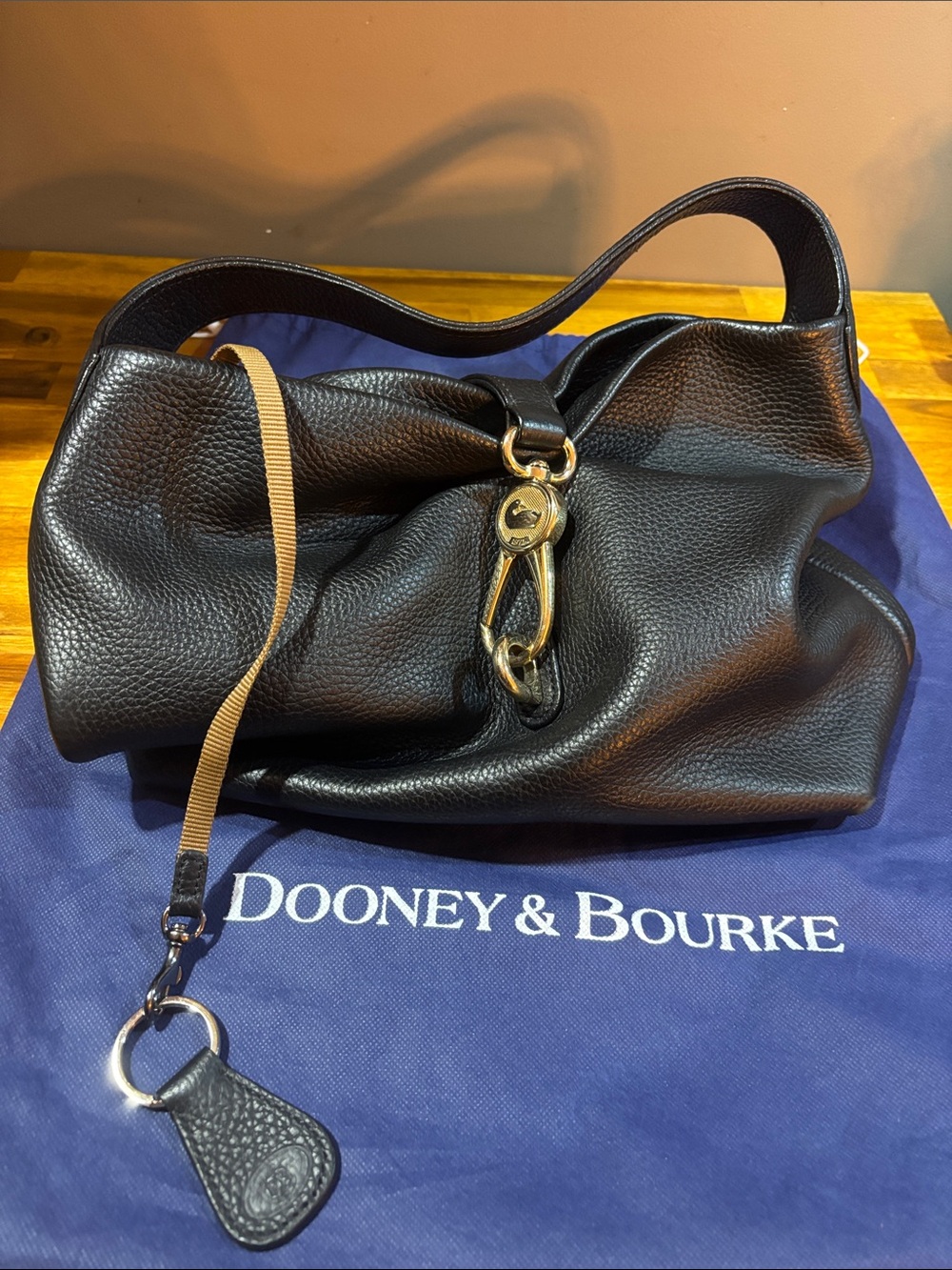 Dooney & Bourke Black Pebble Leather Shoulder Bag with Gold Hardware Hobo Style